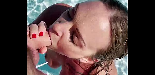  Big tits blonde Tiffany Leiddi gives a sensual BJ in the pool